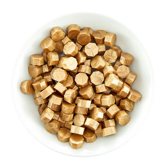 Golden Wax Beads, Sealed by Spellbinders